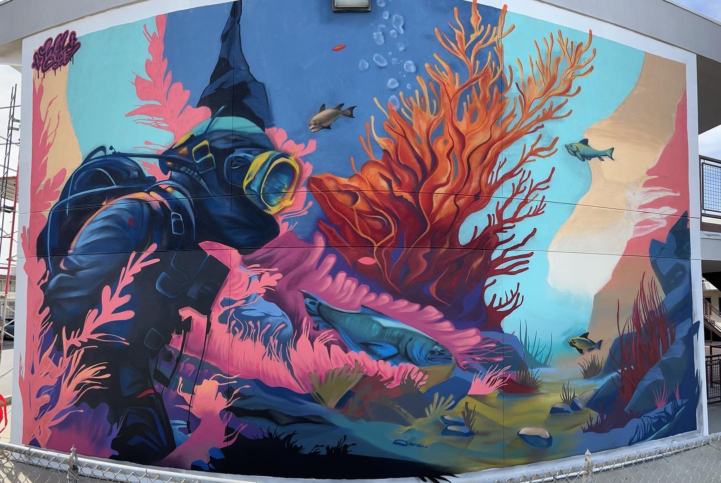 Hiram Johnson High School mural by Sacramento artist Wel Sed exploring educational journey themes
