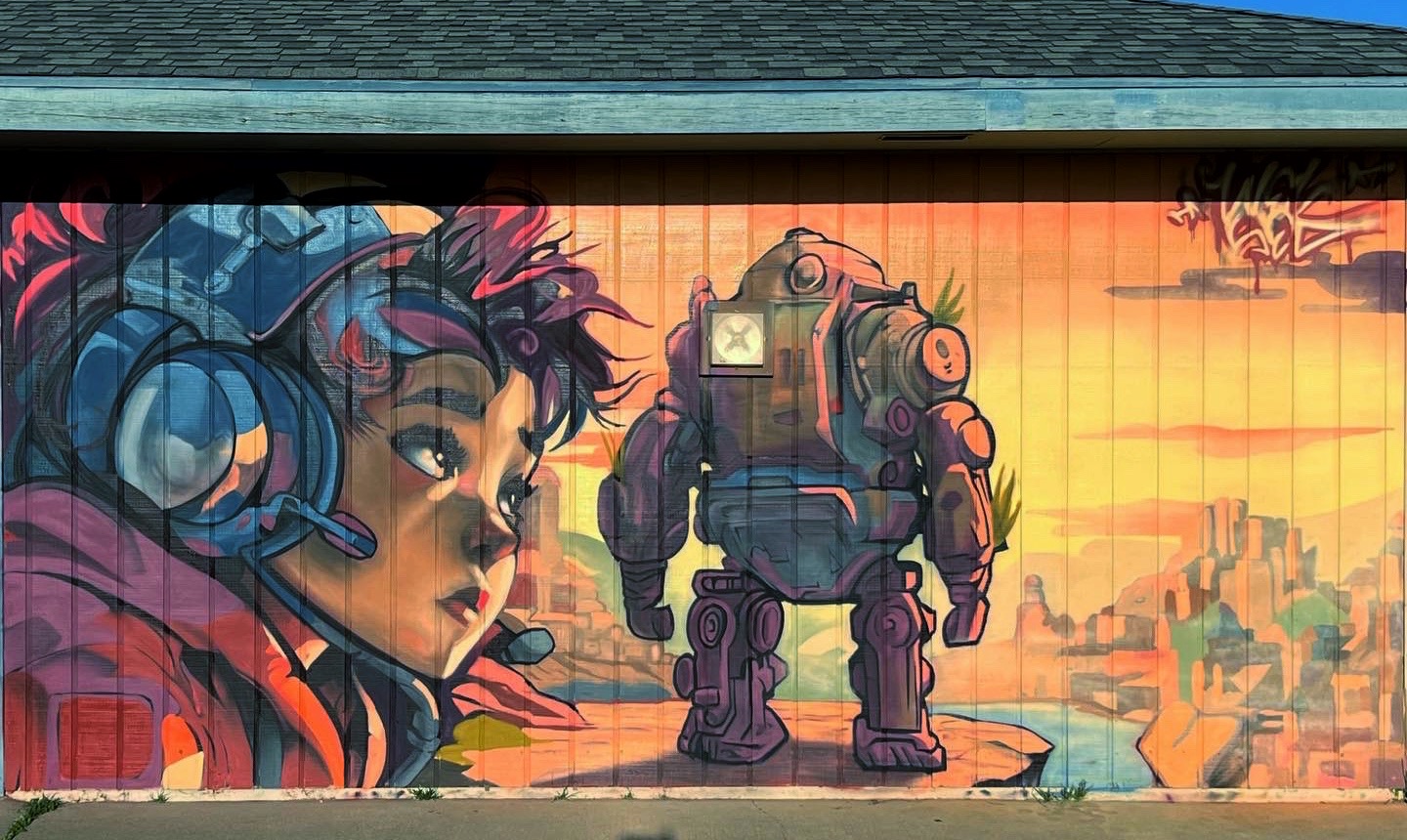 Abraham Lincoln Elementary mural by Wel Sed featuring pilot explorer and ancient robot themes